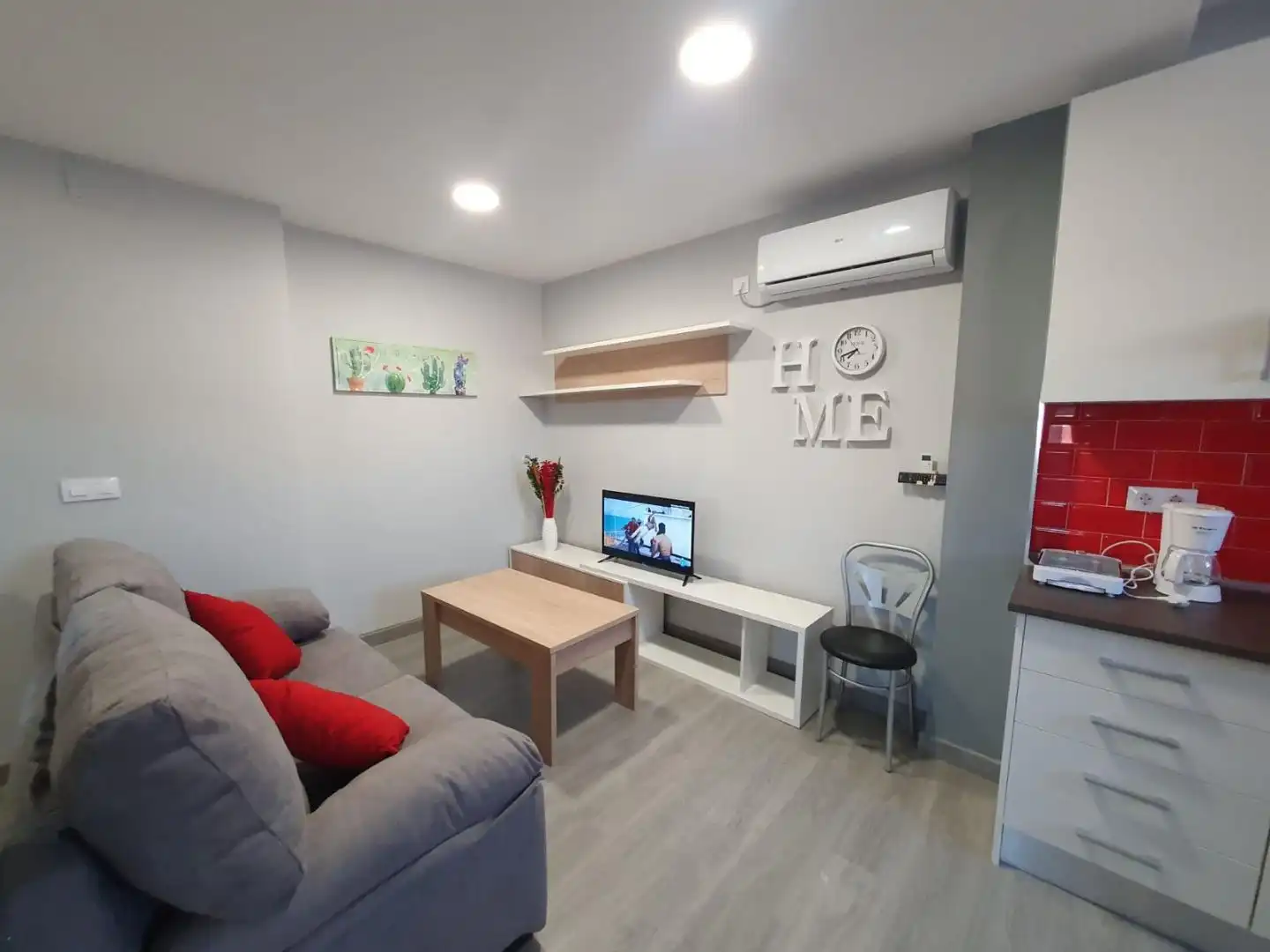 Sala d'estar de Pis de lloguer en Mérida amb Aire condicionat i Moblat