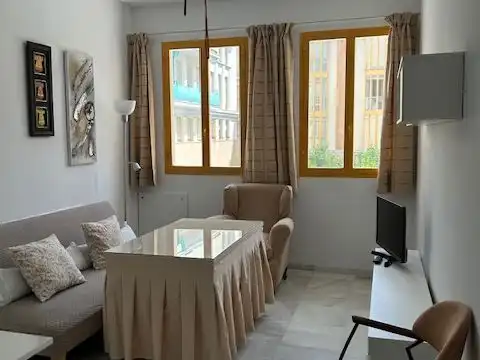Apartament de lloguer a Calle San Jacinto, 64, Triana Oeste Sala d'estar de Apartament de lloguer en Sevilla amb Aire condicionat, Calefacció i Moblat
