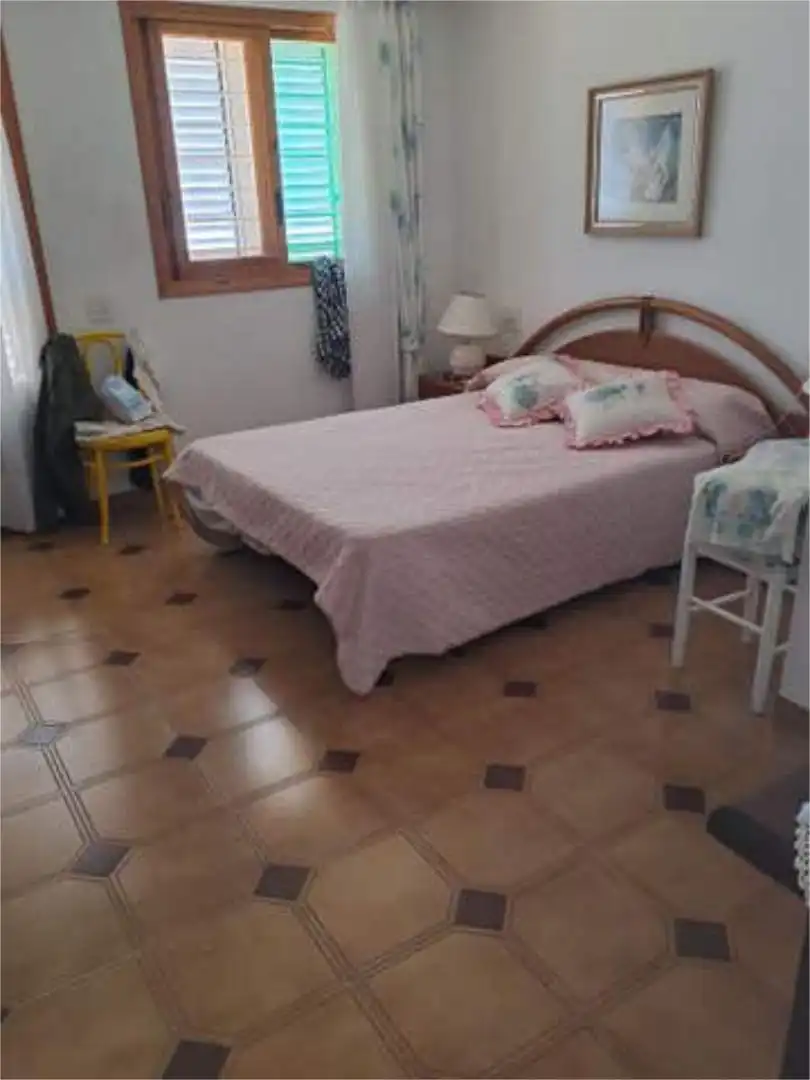 Casa adosada en venta en Els Terrers Habitación de Casa adosada en venta en Benicasim / Benicàssim con Jardín privado, Terraza y Piscina