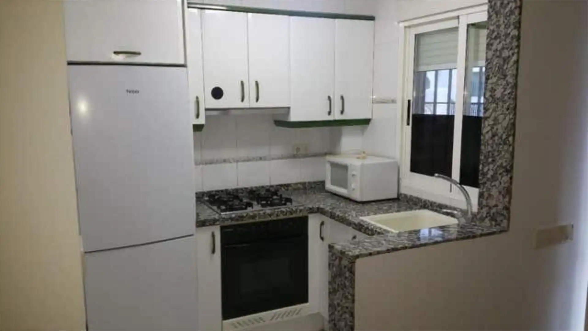 Apartamento de alquiler en Oliva Playa Cocina de Apartamento de alquiler en Oliva con Calefacción, Terraza y Trastero