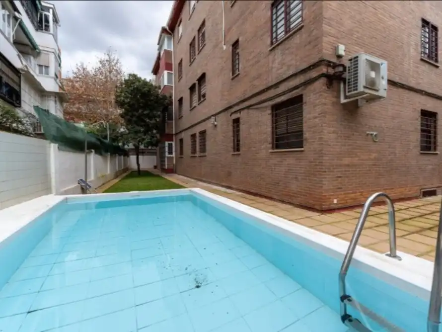 Flat for rent in Calle el Algarrobo, 7, Santa Rosa - Valdeolleros Swimming pool of Flat for rent in Córdoba with Air Conditioner, Heating and Private garden