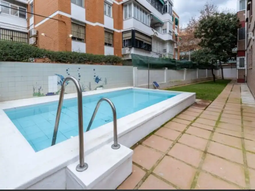 Flat for rent in Calle el Algarrobo, 7, Santa Rosa - Valdeolleros Swimming pool of Flat for rent in Córdoba with Air Conditioner, Heating and Private garden