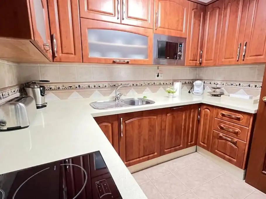 Kitchen of Flat for rent in Torremolinos  with Air Conditioner, Private garden and Parquet flooring
