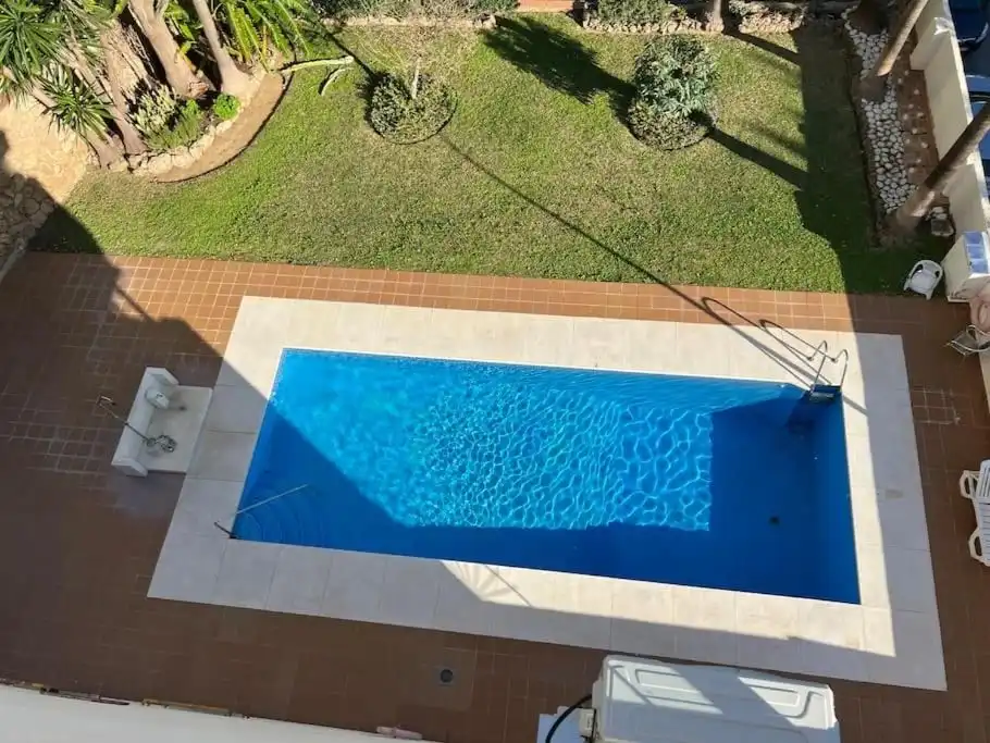 Swimming pool of Flat for rent in Torremolinos  with Air Conditioner, Private garden and Parquet flooring