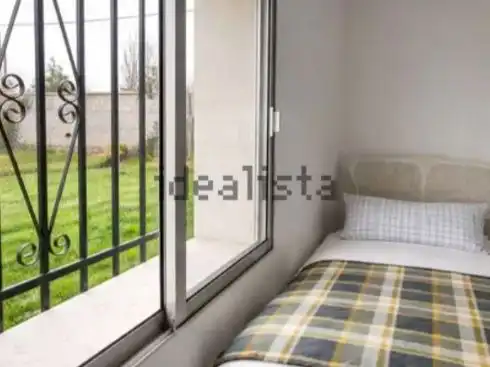 Piso en venta en Calle Almenara de San Juan -1, 51, Garrapinillos Habitación de Piso en venta en Zaragoza con Aire acondicionado, Calefacción y Jardín privado