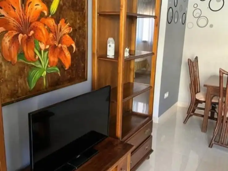 Sala de estar de Piso en venta en Nerja con Terraza, Piscina y Amueblado
