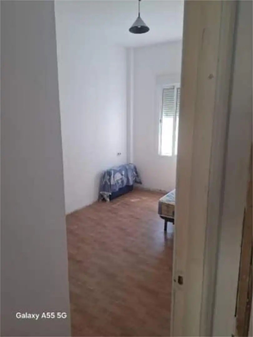 Wohnung zum Verkauf in El Castillo de las Guardas Schlafzimmer von Wohnung zum Verkauf in El Castillo de las Guardas mit Privatgarten und Schwimmbad