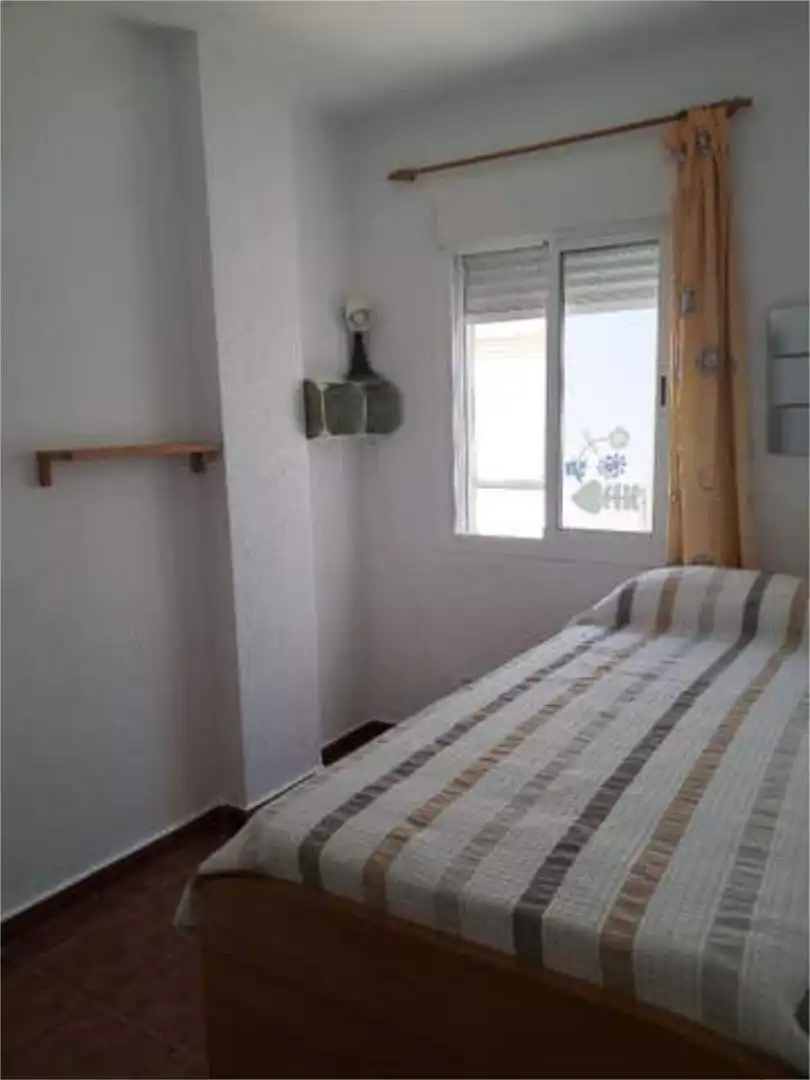Wohnungen zur Miete in Los Gallos Schlafzimmer von Wohnungen zur Miete in Chiclana de la Frontera mit Privatgarten, Terrasse und Schwimmbad