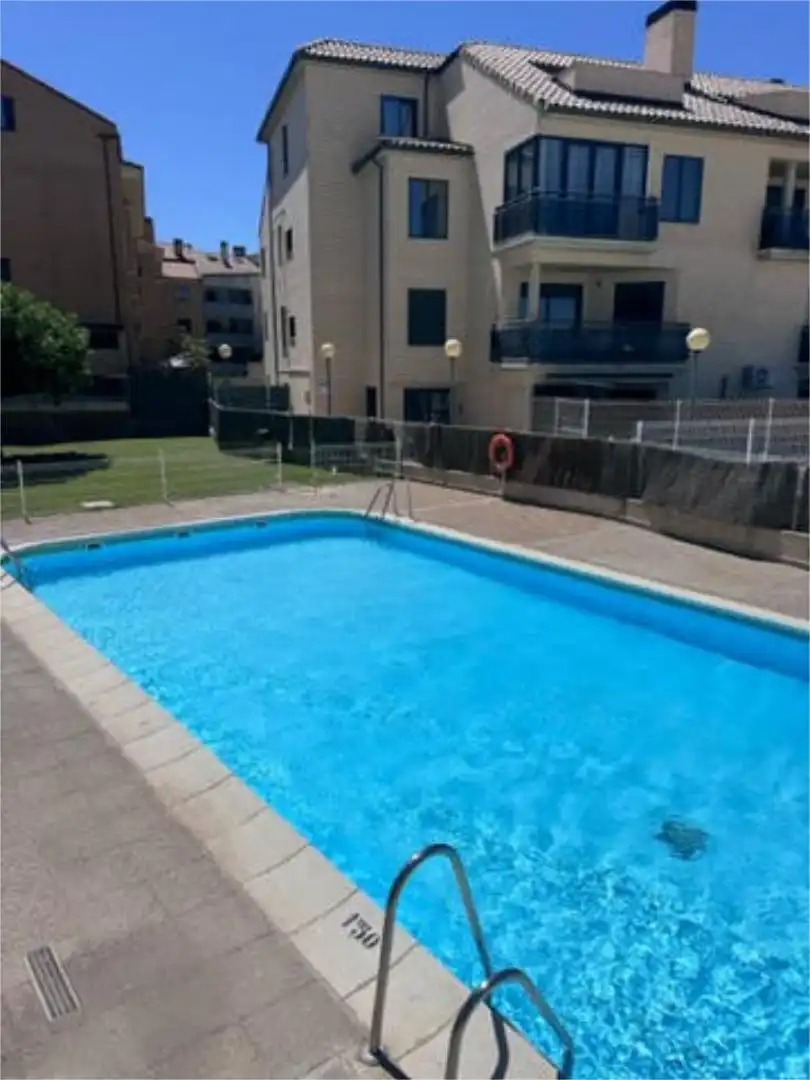 Wohnung zum Verkauf in La Muela Schwimmbecken von Wohnung zum Verkauf in La Muela mit Heizung, Privatgarten und Terrasse