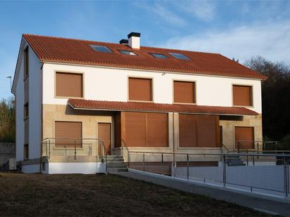 Vista exterior de Casa o xalet en venda en Sanxenxo amb Aire condicionat